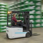 Thumbnail of http://An%20employee%20operating%20the%20Unicarriers%20TX30%203%20Wheel%20Forklift%20in%20a%20Beverage%20Warehouse