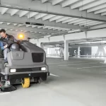 Thumbnail of http://A%20Worker%20Operating%20a%20Karcher%20B300%20Sweeper%20Scrubber%20Inside%20a%20Parking%20Garage