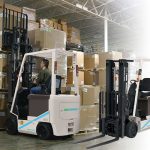 Thumbnail of http://A%20Warehouse%20Worker%20Lifting%20a%20Pallet%20off%20a%20Stack%20of%20Pallets%20With%20The%20Unicarriers%20BX50%20Electric%20Forklift