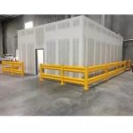 Thumbnail of http://A%20Yellow%20Guard%20Rail%20Surrounding%20a%20Clean%20Room%20Inside%20of%20a%20Warehouse