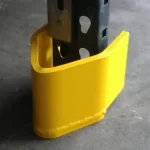 Thumbnail of http://A%20Closeup%20View%20of%20a%20Yellow%20V-Nose%20Pallet%20Racking%20Protector%20on%20a%20Pallet%20Rack%20Inside%20of%20a%20Warehouse