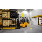 Thumbnail of http://A%20worker%20operating%20a%20Bendi%20deep%20reach%20forklift%20inside%20of%20a%20warehouse