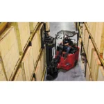 Thumbnail of http://A%20worker%20loading%20a%20pallet%20in%20a%20narrow%20aisle%20on%20a%20bendi%20forklift