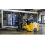 Thumbnail of http://A%20worker%20loading%20a%20pallet%20of%20soda%20into%20a%20trailer%20with%20a%20Landoll%20Bendi%20b55ac%20forklift