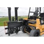 Thumbnail of http://the%20mast%20extended%20sideways%20on%20a%20drexel%20swingmast%20forklift%20outside