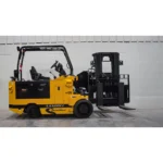 Thumbnail of http://Drexel%20Swingmast%20SL120%20Forklift%20inside%20an%20empty%20warehouse