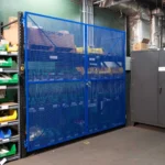 Thumbnail of http://A%20blue%20security%20enclosure%20panel%20on%20a%20row%20of%20pallet%20racking