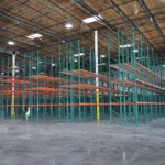 Thumbnail of http://A%20pallet%20racking%20system%20being%20installed%20inside%20of%20an%20empty%20warehouse