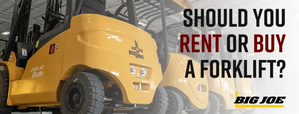 Yellow Big Joe Forklifts lined up inside of an empty warehouse